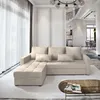 A modern living room with a cream-colored sectional sofa. Produktbild-Vorschau