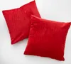 Two red square pillows are placed on a white background. Produktbild-Vorschau
