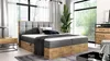 A modern bedroom with a large window, a bed, a nightstand, and a dresser. Náhled obrázku produktu