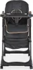 A studio shot of a black high chair with rose gold accents. Produktbild-Vorschau