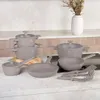 A set of gray cookware is displayed on a kitchen counter. Produktbild-Vorschau