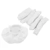 A collection of disposable ear covers and a single ear cover laid out on a white background. Podgląd zdjęcia produktu