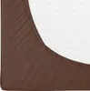 A close-up view of a brown fitted sheet on a white mattress. Produktbild-Vorschau