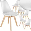 A set of white dining chairs with wooden legs arranged on a white background. Náhled obrázku produktu