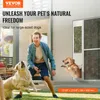 A man is playing with two golden retrievers in a backyard, with one dog exiting a pet door. Produktbild-Vorschau