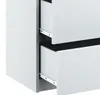 Close-up view of two open drawers of a white dresser. Produktbild-Vorschau