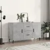 A modern living room setting with a grey sideboard. Produktbild-Vorschau