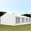 A white party tent with arched windows is set up on a grassy lawn with trees and a blue sky in the background. Anteprima dell’immagine prodotto