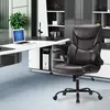 An office chair is placed in front of a desk with a computer and a plant in an office setting. Produktbild-Vorschau