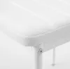 A close-up view of the white seat and white metal leg of a chair, showing a screw detail. Voir les images du produit