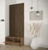 A modern entryway with a wooden slatted panel and a bench with storage, decorated with a large vase of dried flowers. Náhled obrázku produktu