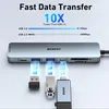 A close-up of a USB hub with various devices plugged in, illustrating fast data transfer. Produktbild-Vorschau