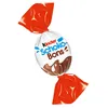 A single Kinder Schoko-Bons candy, individually wrapped in orange foil, against a white background. Podgląd zdjęcia produktu