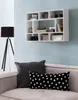 A modern living room scene with a wall shelf and sofa. Náhled obrázku produktu