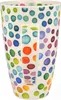 A close-up studio shot of a mug with a colorful polka dot pattern. Produktbild-Vorschau