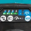 A close-up view of the control panel of a power tool, showing indicator lights and mode selection. Produktbild-Vorschau