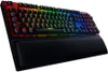 A gaming keyboard with RGB lighting and a wrist rest. Produktbild-Vorschau