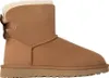 A single brown Ugg boot with a bow on the back, shown from the side against a white background. Produktbild-Vorschau