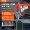 A red electric hoist is shown lifting a green weight, with text overlays detailing its specifications. Náhľad obrázku produktu