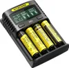 A Nitecore UMS4 battery charger with four rechargeable batteries inserted. Podgląd zdjęcia produktu