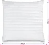 A white quilted pillow is shown flat against a white background. Dimensions are indicated with pink lines and text. Produktbild-Vorschau