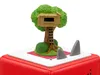 A close-up shot of a Tonies figurine featuring a treehouse and shark fins on a red base. Produktbild-Vorschau