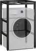 A black metal shelf unit designed to hold a washing machine, with a washing machine shown inside and partially transparent. Náhľad obrázku produktu