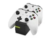 Two white Xbox controllers are placed in a black charging dock. Produktbild-Vorschau