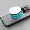 A smartphone case is shown with a wireless charger attached, highlighting its MagSafe compatibility. Produktbild-Vorschau