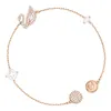 A close-up studio shot of a delicate rose gold bracelet with various charms, set against a plain white background. Anteprima dell’immagine prodotto