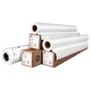 Several rolls of paper are stacked and arranged in front of a white background. Some rolls are in cardboard boxes, while others are partially unwrapped. Produktbild-Vorschau