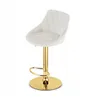 A beige upholstered bar stool with a gold base and stem, shown against a white background. Produktbild-Vorschau