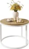 A round coffee table with a wooden top and white metal legs, decorated with a vase of yellow flowers, a cup of coffee, and candles. Náhled obrázku produktu