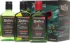 Three bottles of Ardbeg whisky are displayed in front of their branded box, which features artwork and text. Produktbild-Vorschau