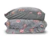 A stack of folded bedding with a sports ball pattern. Produktbild-Vorschau