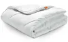A folded white comforter is shown against a white background. Produktbild-Vorschau