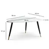 A diagram showing the dimensions of a triangular coffee table with a marble-like top and three black legs with gold accents. Voir les images du produit