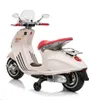 A white electric scooter for children. Podgląd zdjęcia produktu