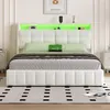 A white upholstered bed with a tufted headboard and integrated LED lighting is shown in a bedroom setting. Produktbild-Vorschau