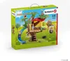 The image shows the packaging of a Schleich Farm World Adventure Treehouse playset. Anteprima dell’immagine prodotto