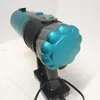 A close-up, angled view of the main body of a handheld vacuum cleaner, resting on a black charging base. Produktbild-Vorschau