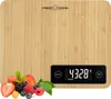 A digital kitchen scale with a bamboo surface, showing a reading of 4328 grams and a selection of berries at the bottom. Voir les images du produit