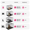 A size chart for dog crates, showing different sizes (S, M, L, XL) with corresponding dimensions and weight capacities, illustrated with dogs in each crate. Náhled obrázku produktu
