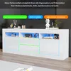 A white TV stand with illuminated compartments, showcasing its storage options. Produktbild-Vorschau