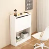 A white shelf unit with a fold-down top surface, placed against a light beige wall. Items like a French press, a small cup, and books are on and around the unit. Podgląd zdjęcia produktu