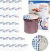 A collection of empty glass jars and a jar of jam, along with a product box and a decorative plate. Voir les images du produit