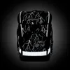 A black backpack with a lightning bolt pattern and reflective strips, shown from the front against a dark background. Produktbild-Vorschau