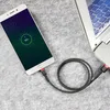 A smartphone is being charged by a laptop using a USB cable. Náhled obrázku produktu