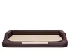 A dog bed with a brown border and a beige sleeping surface, presented on a white background. Produktbild-Vorschau