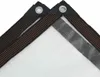 Close-up of two corners of a clear tarp with reinforced edges and grommets. Produktbild-Vorschau
